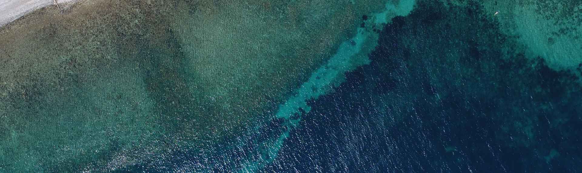 Image of the waves on the beach taken from above